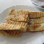 Msemmen, a fried dough breakfast pancake, with honey