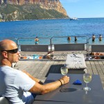 Enjoying the local wine after a long walk to explore the Calanques, at Plage de Bestouan